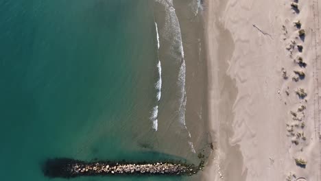 Drone-shot-over-mediterranean-beach-in-Camargue.-Vertical-top-view,-high-altitud